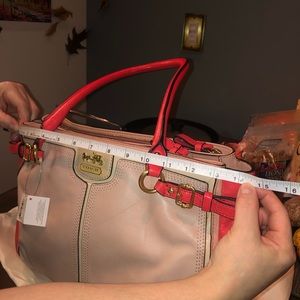NWT Coach multicolored coral medium hand bag.